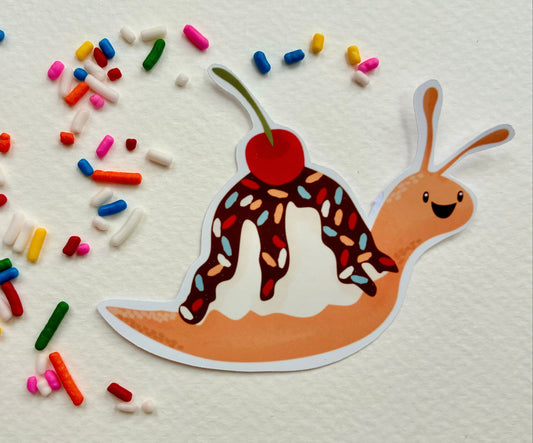 Colorful snail stickers with an ice cream sundae shell with sprinkles on a textured white background